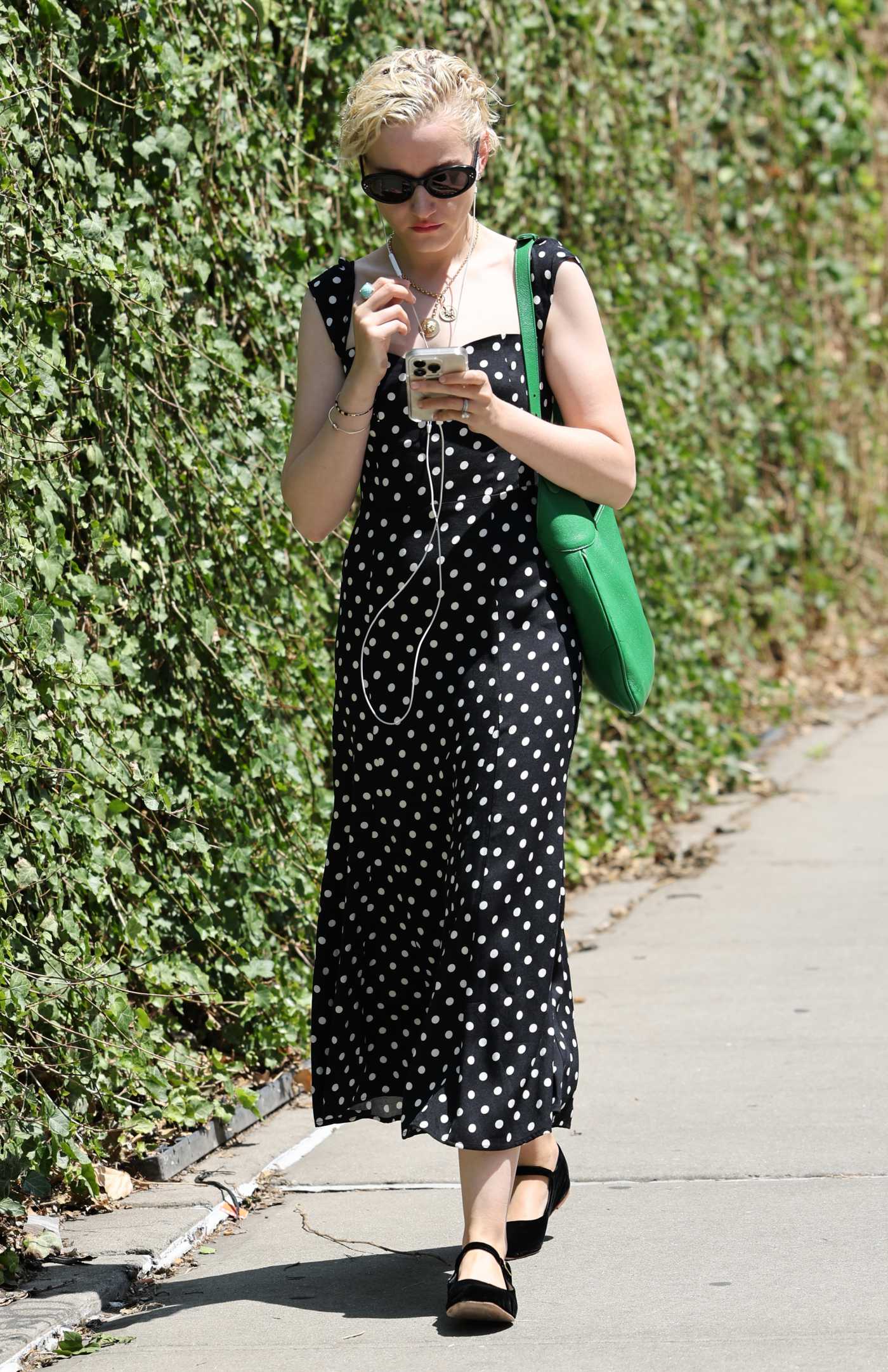 Julia Garner in a Black Polka Dot Dress Was Seen Out in New York 05/27/2023