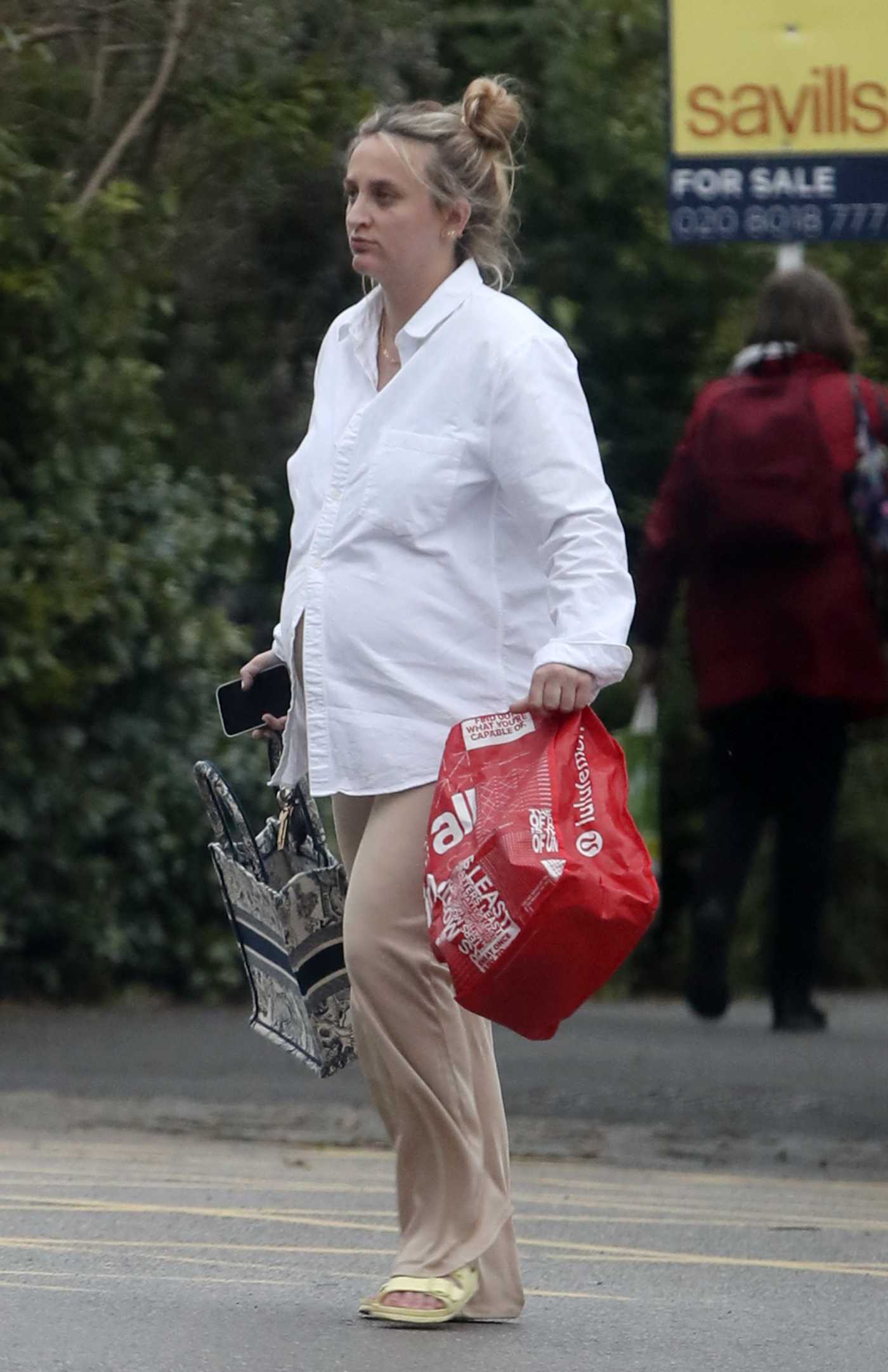 Tiffany Watson in a White Shirt Getting a Few Things from a Waitrose in London 05/13/2023