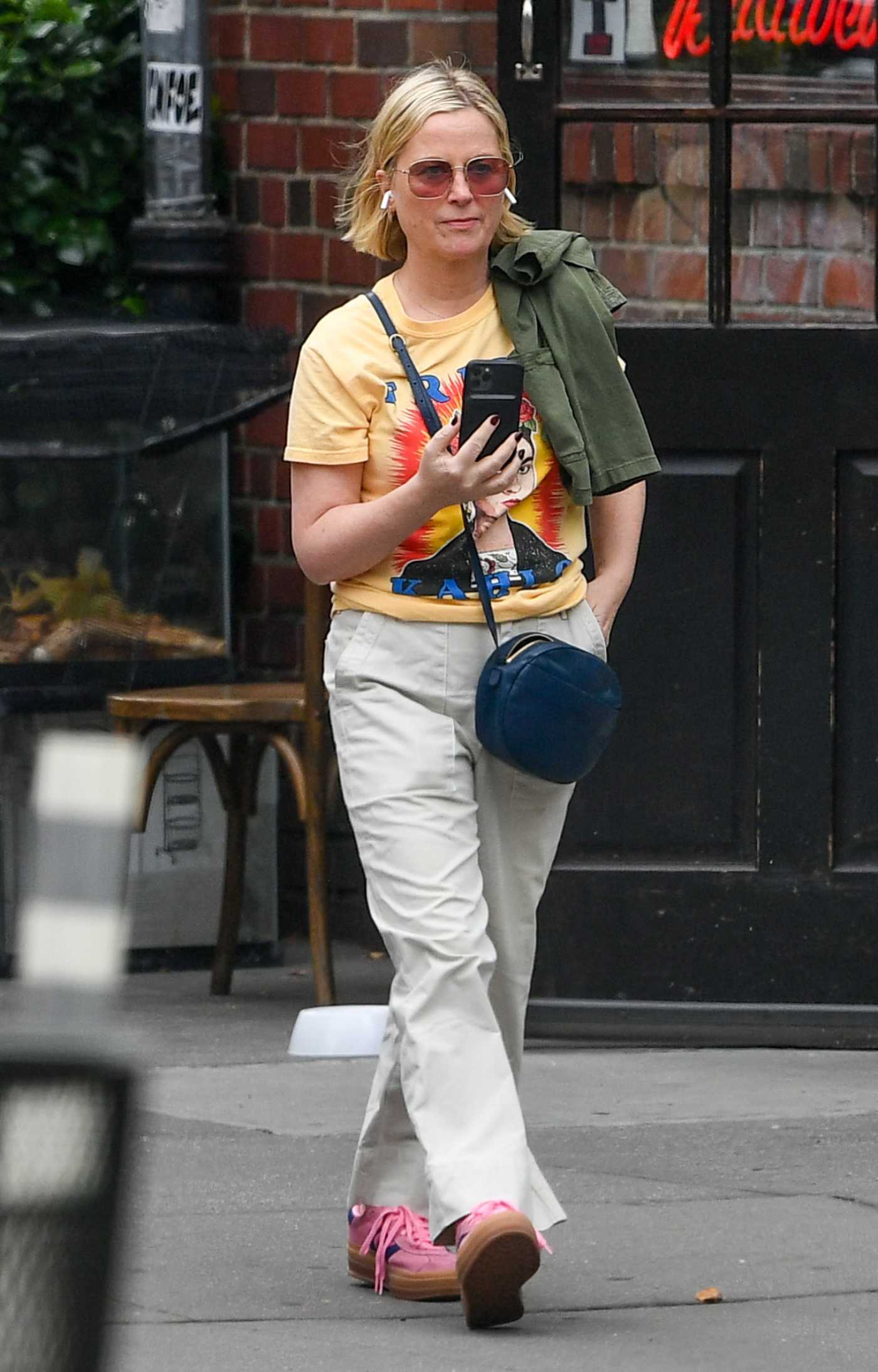 Amy Poehler in a Yellow Tee Was Spotted on a Stroll in New York 06/15/2023