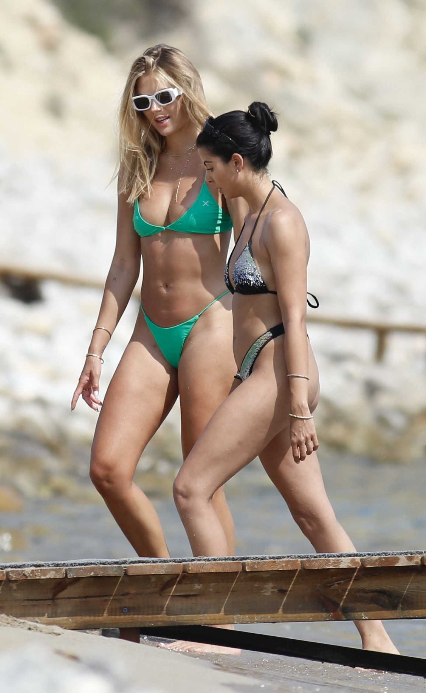 Arabella Chi in a Green Bikini Was Seen Out with a Friend on the Beach in Ibiza 06/27/2023