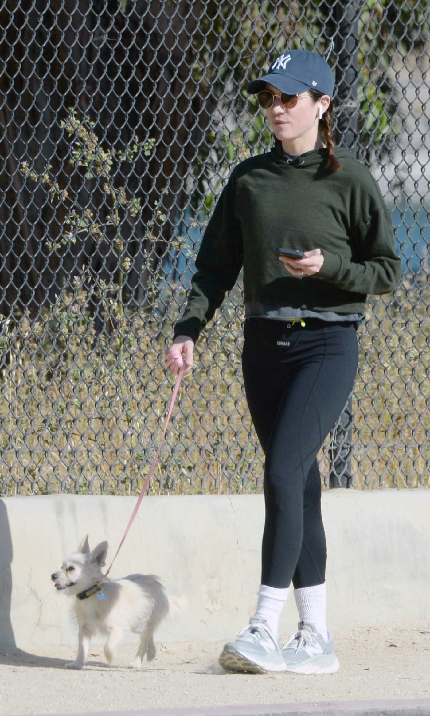 Brittany Snow in a Black Cap Walks Her Dog at Silver Lake in Los Angeles 06/26/2023