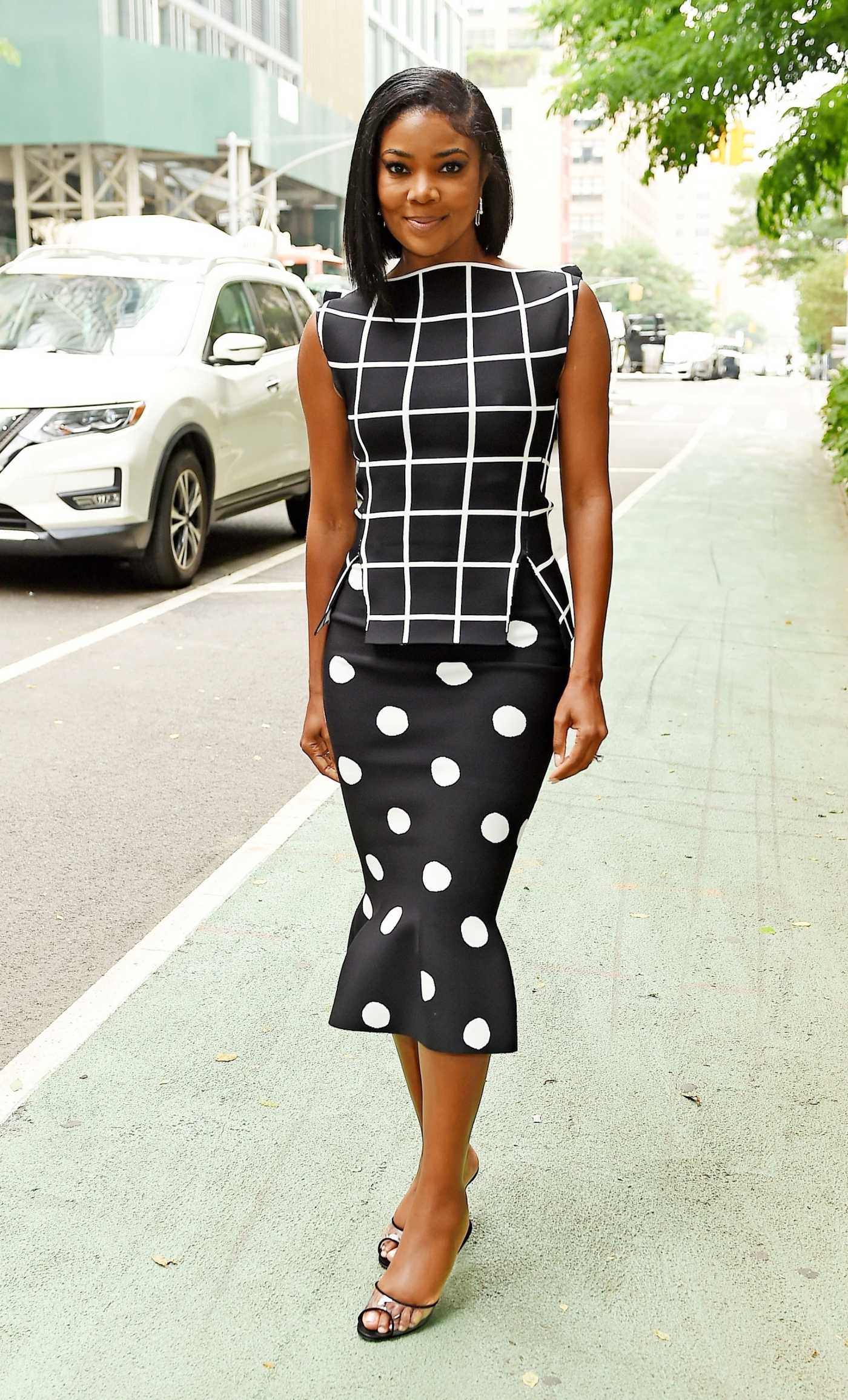 Gabrielle Union in a Black Polka Dot Skirt Arrives to Watch What Happens Live in New York 06/12/2023