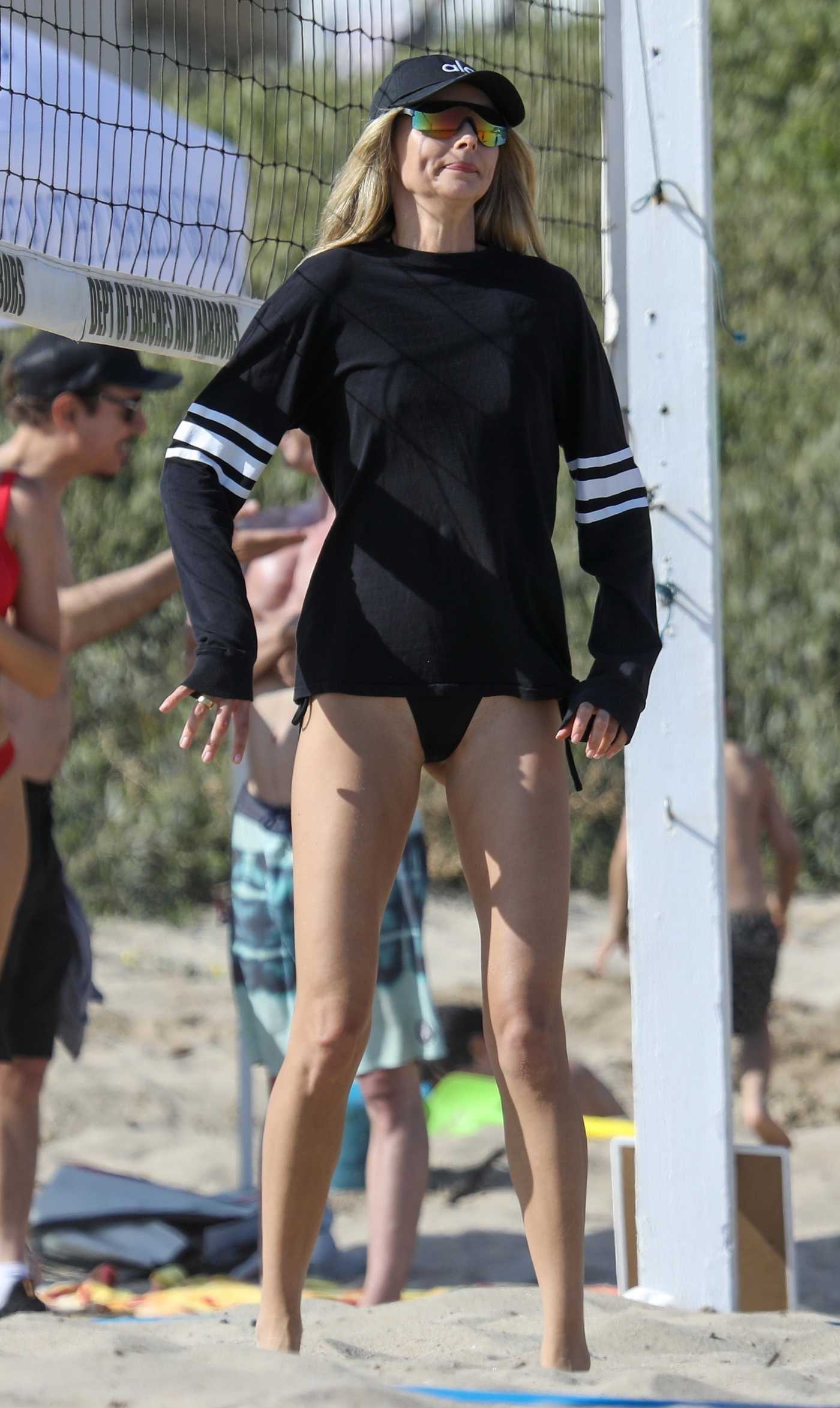 Ludi Delfino in a Black Cap Plays Volleyball on the Beach in Santa Monica 06/17/2023