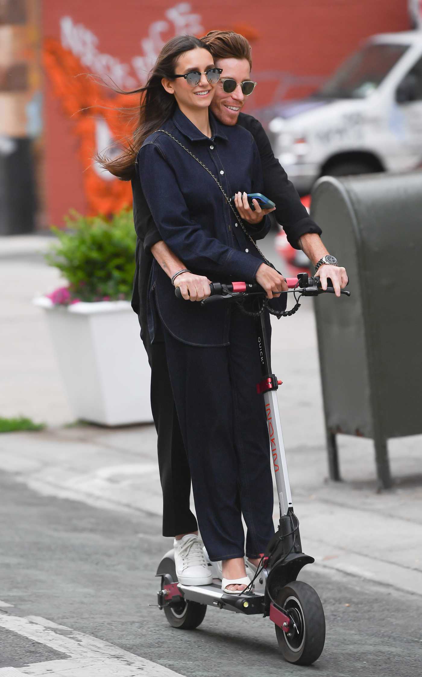Nina Dobrev in a Blue Denim Shirt Rides a Scooter with Shaun White Through New York 06/20/2023