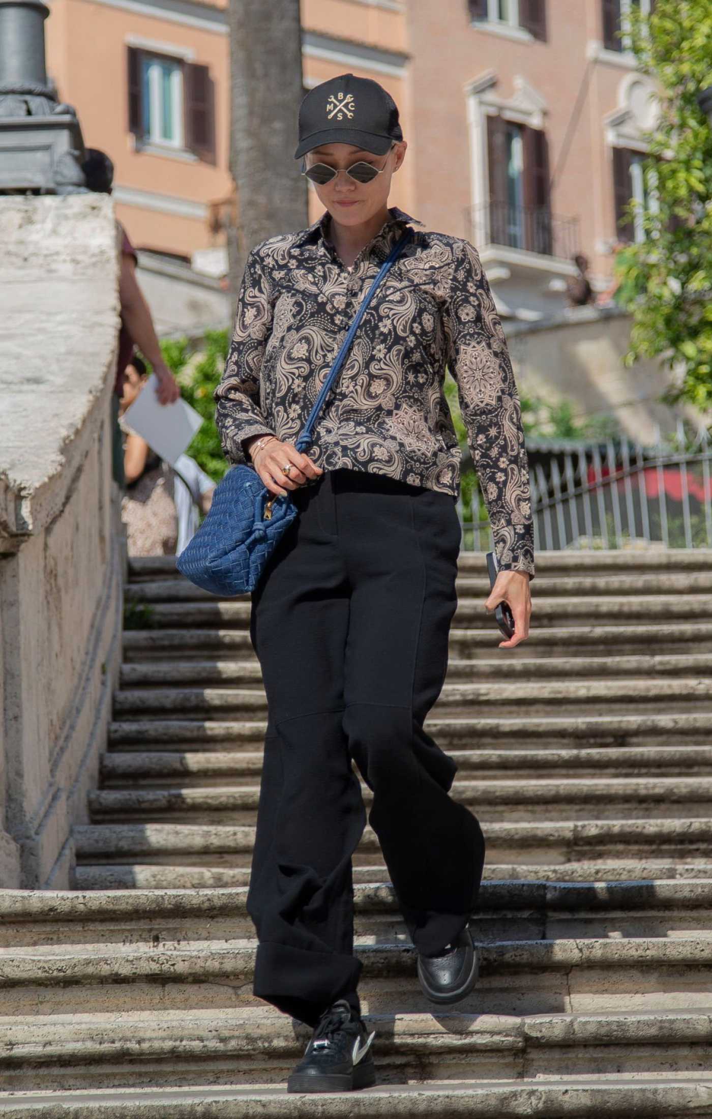 Pom Klementieff in a Black Cap Was Seen Out in Rome 06/16/2023