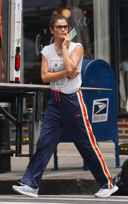 Helena Christensen in a Blue Track Pants