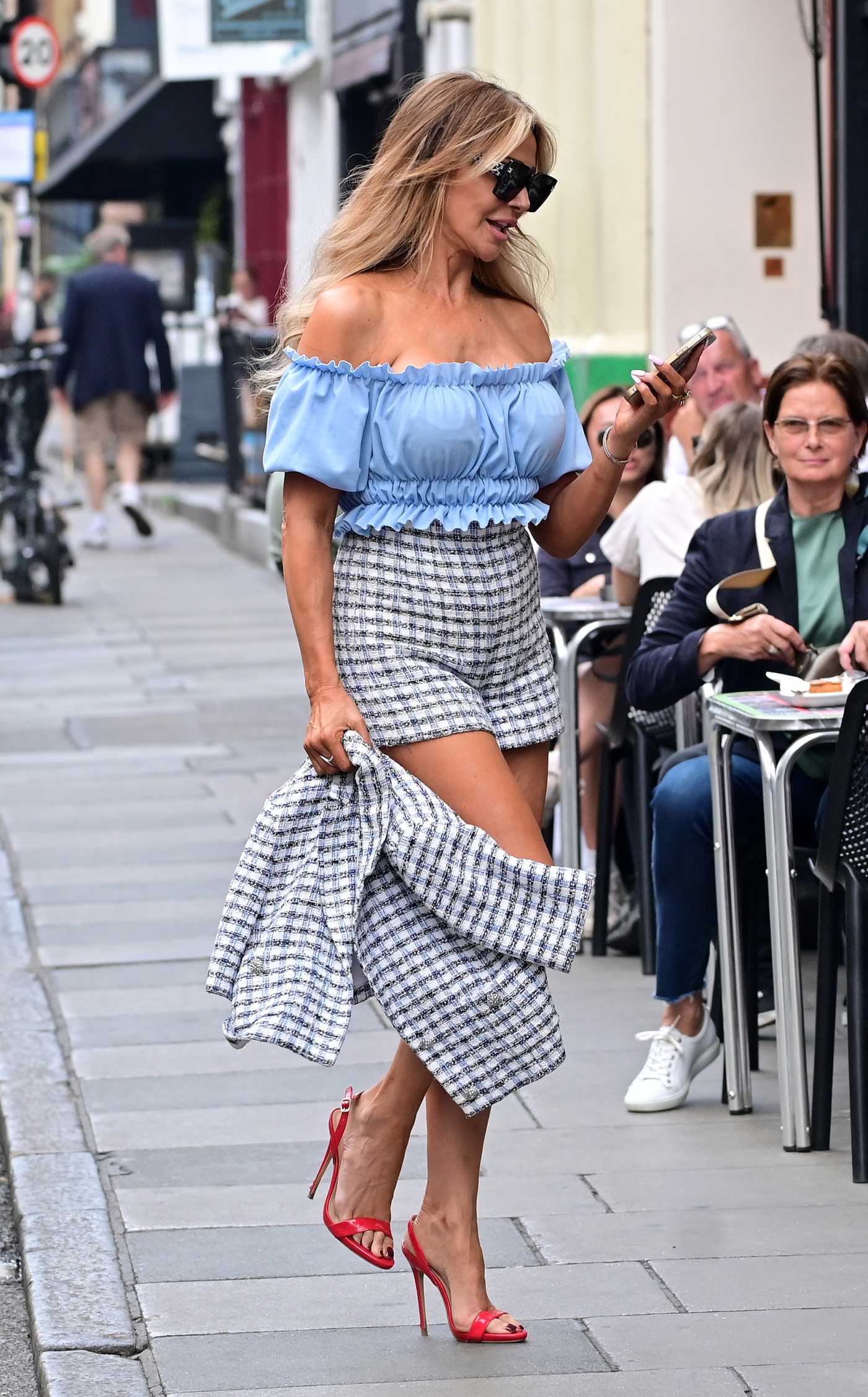 Lizzie Cundy in a Blue Blouse Was Seen Out in Soho in NYC 07/06/2023