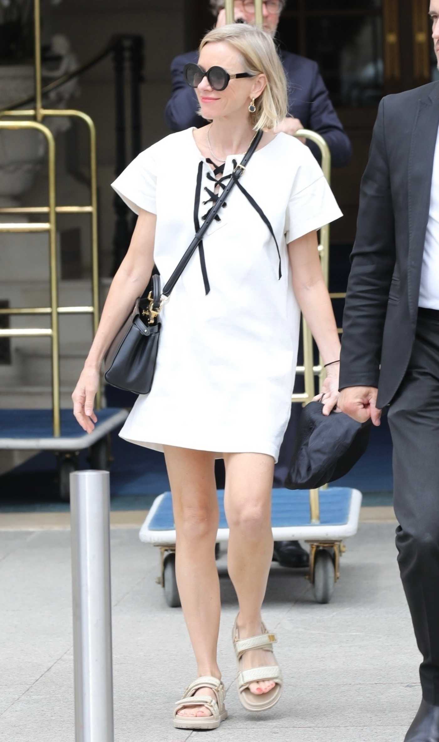 Naomi Watts in a White Dress Leaves Her Hotel in Paris 07/07/2023