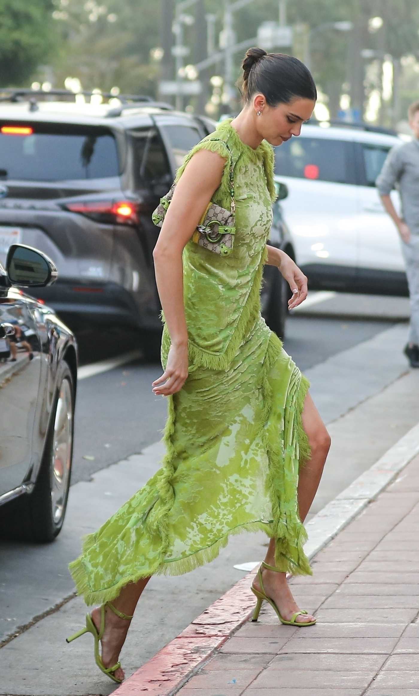 Kendall Jenner in an Olive Dress Heads to Her 818 Party at Mon Ami Restaurant in Santa Monica 08/17/2023