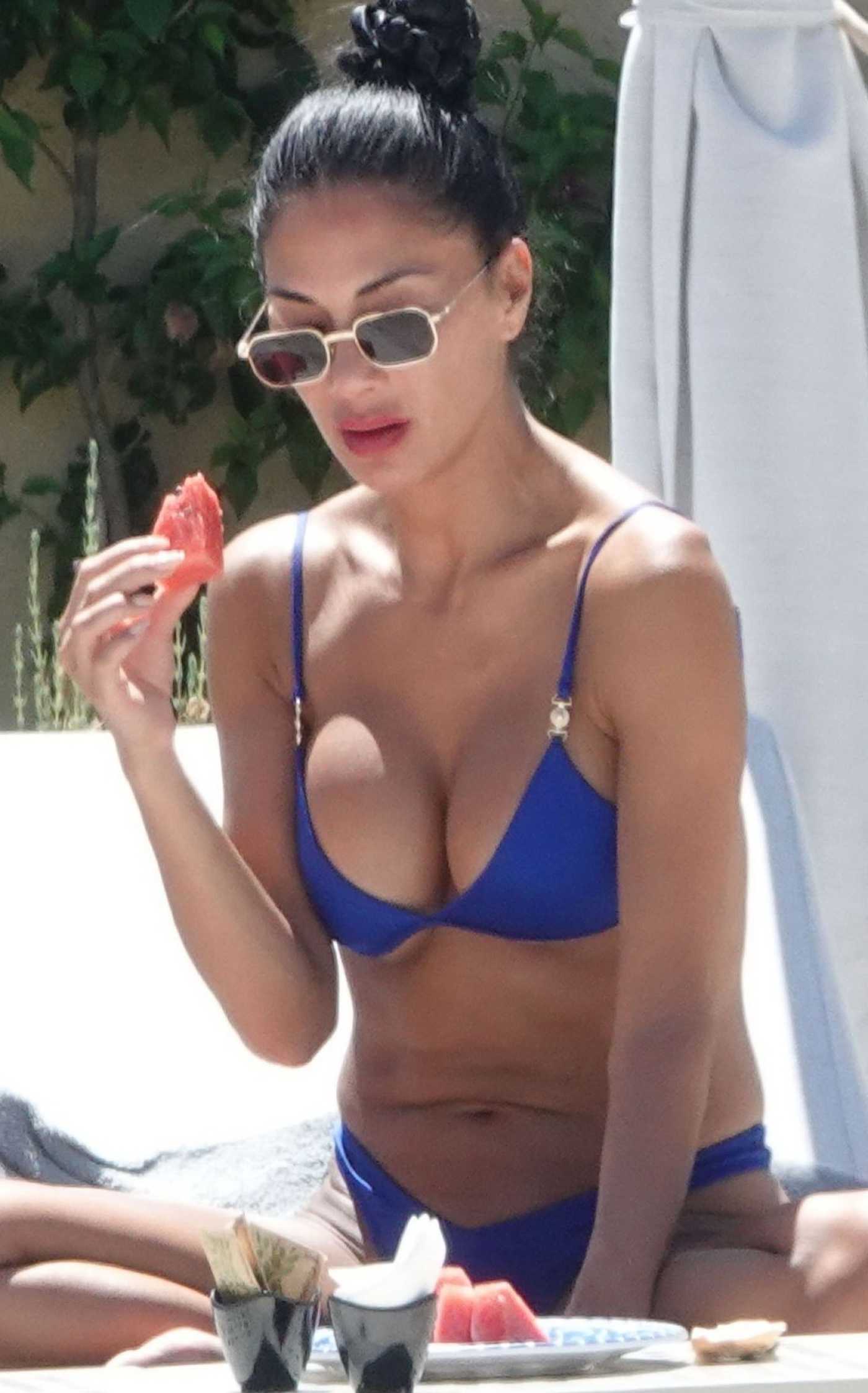 Nicole Scherzinger in a Blue Bikini on the Beach in Sardinia 08/10/2023