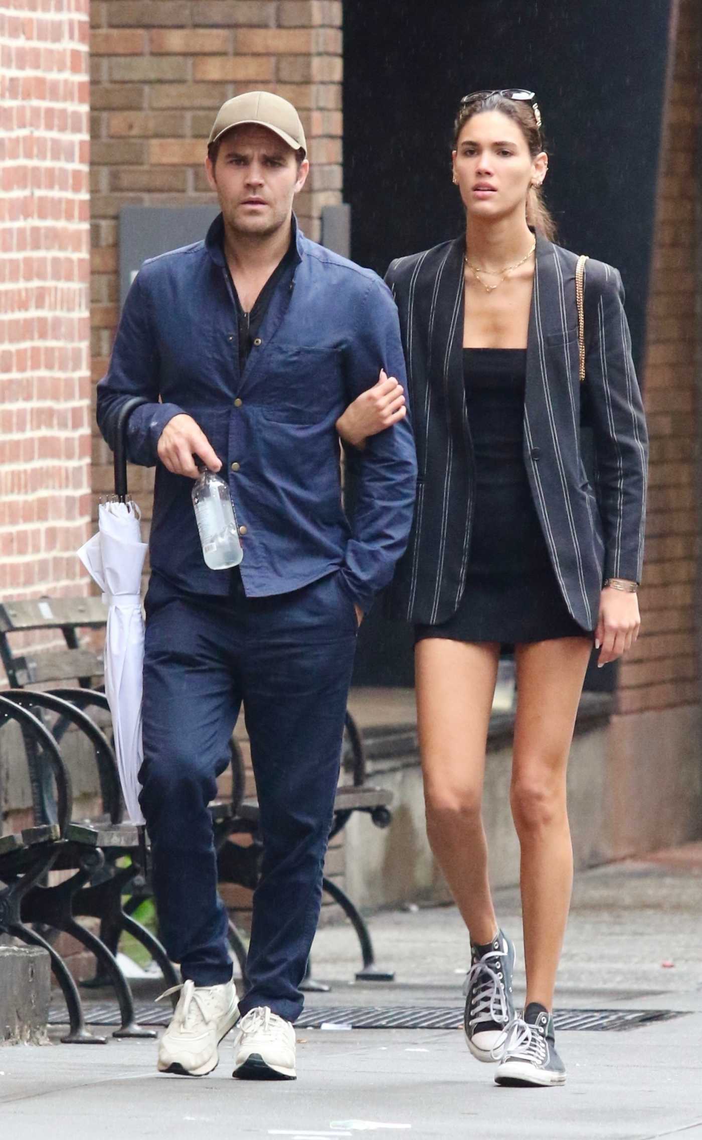 Paul Wesley in a Beige Cap Enjoys a Romantic Walk with Natalie Kuckenburg in New York 08/24/2023