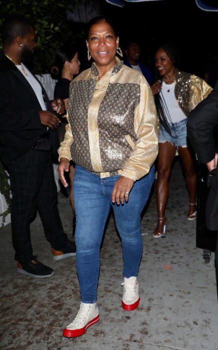 Queen Latifah in a Blue Slim Jeans