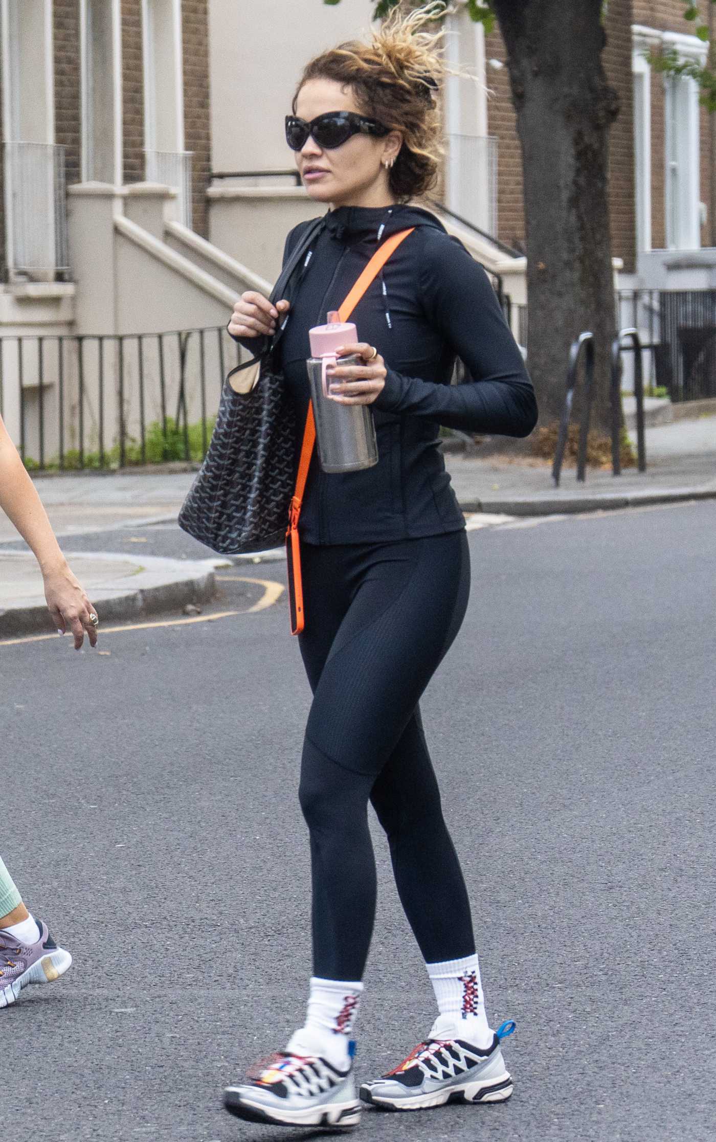 Rita Ora in a Black Workout Ensemble Leaves a Gym Session with Her Sister Elena in London 08/07/2023