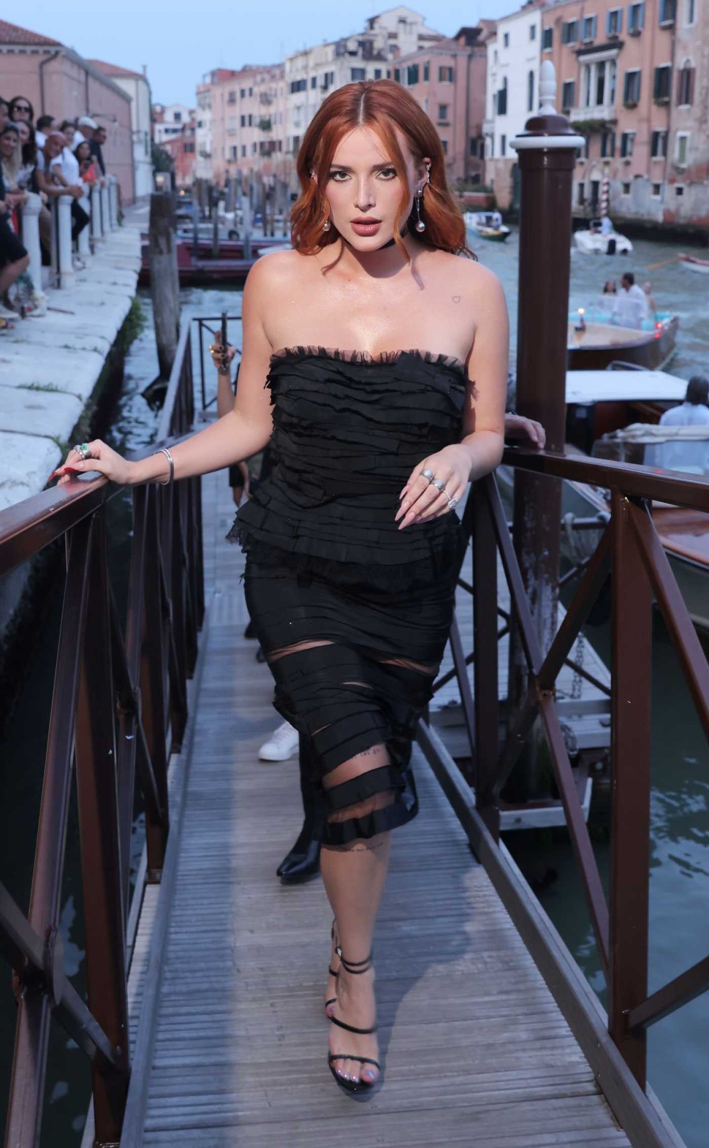 Bella Thorne Attends 2023 amfAR Gala Venezia in Venice 09/03/2023