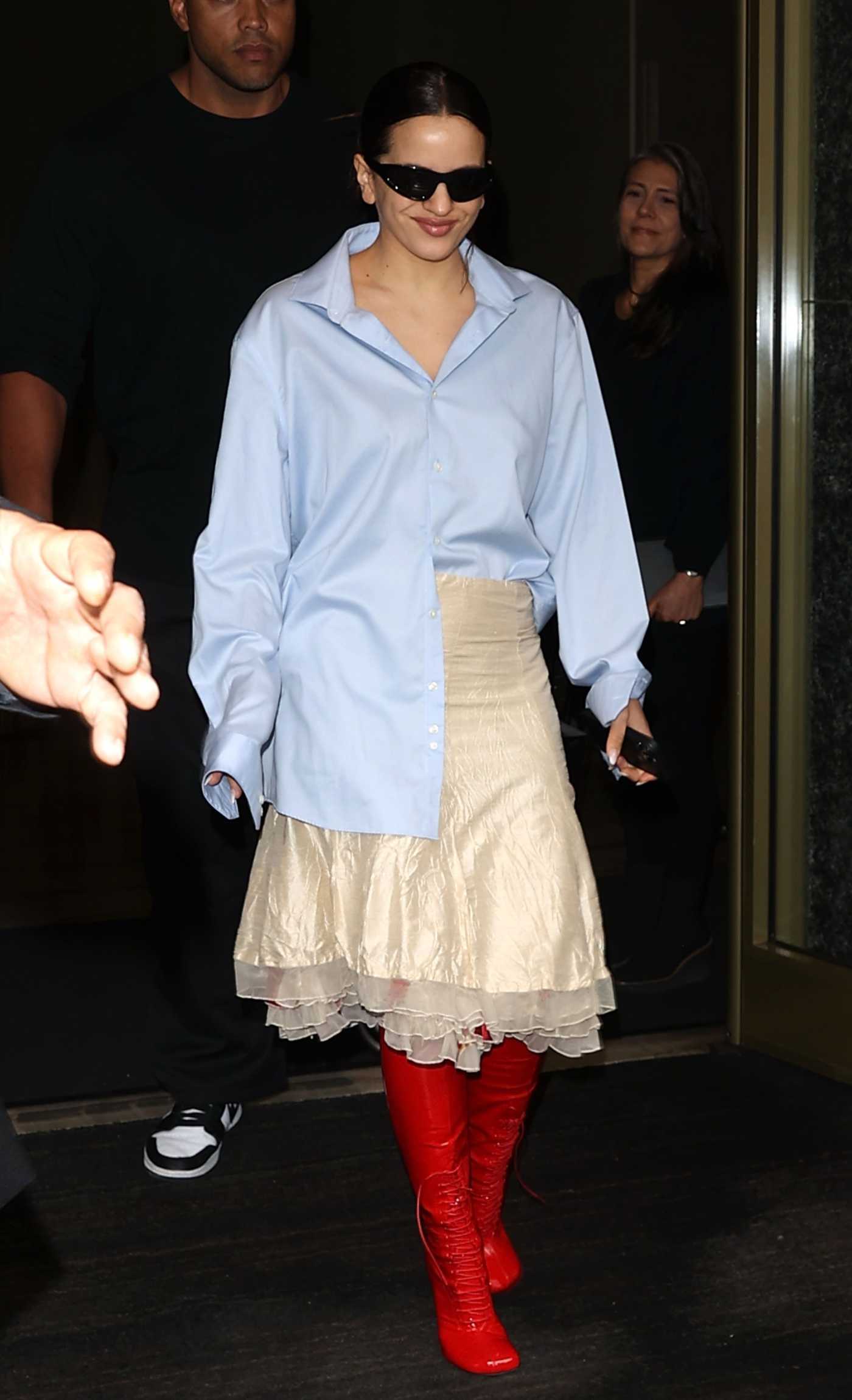 Rosalia in a Blue Shirt Exits Her Hotel in Milan 09/22/2023