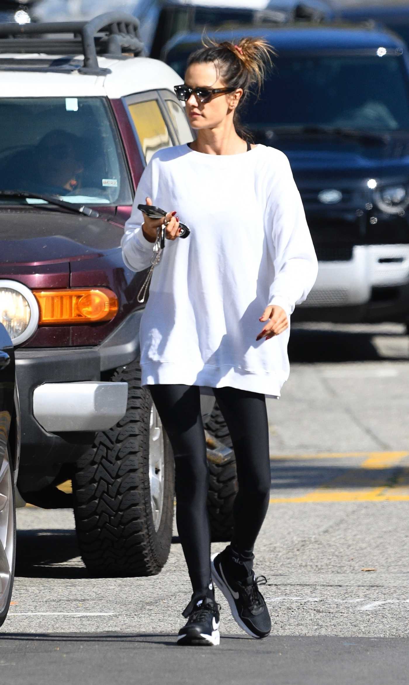 Alessandra Ambrosio in a White Oversized Sweatshirt Was Seen Out in Brentwood 10/27/2023