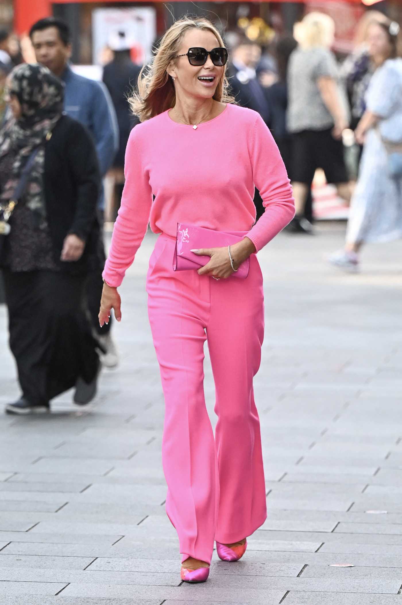 Amanda Holden in a Pink Ensemble Leaves the Heart FM Studios in London 10/10/2023