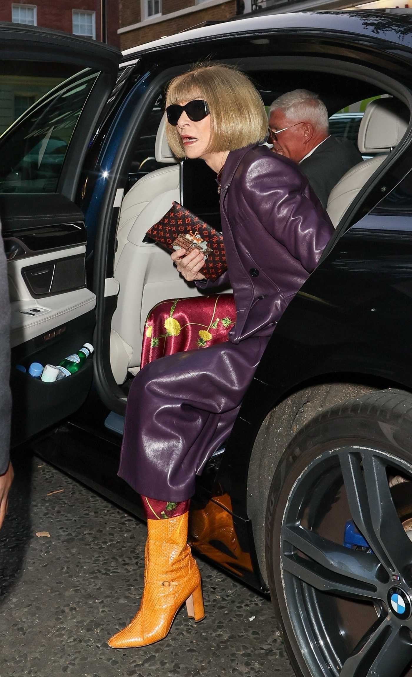 Anna Wintour in a Purple Leather Coat Arrives at Beckham TV Show Premiere at the Curzon Mayfair in London 10/03/2023