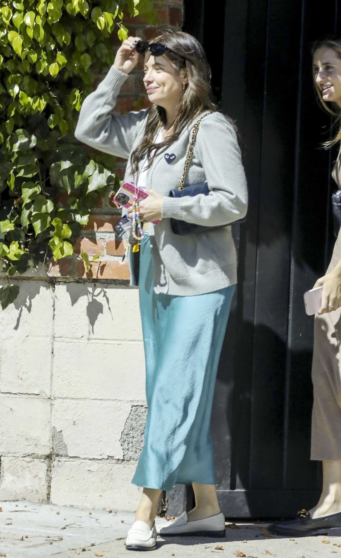 Ashley Benson in a Grey Cardigan Leaves the Hair Salon in Beverly Hills  10/07/2023