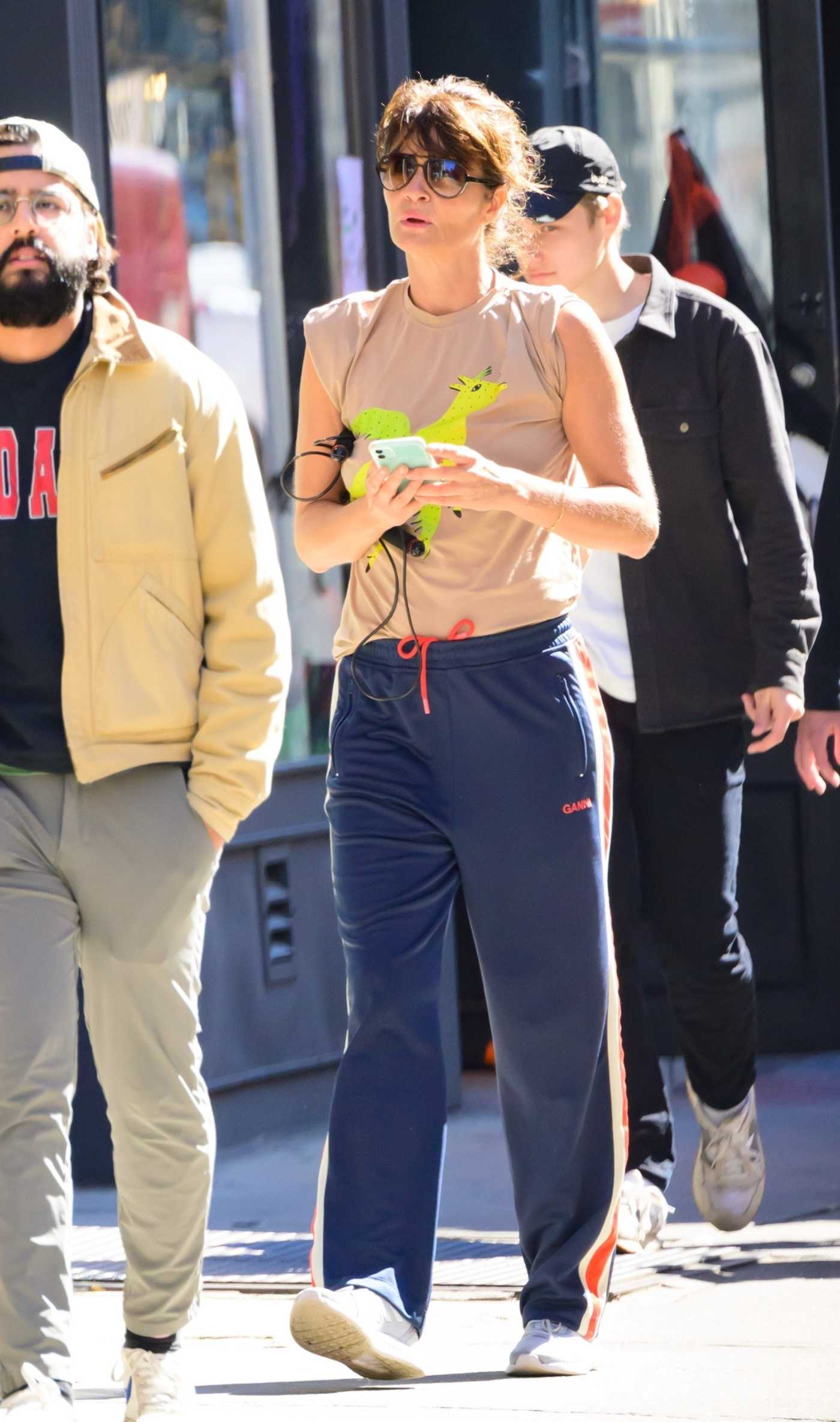 Helena Christensen in a Blue Track Pants Was Seen Out in New York 10/13/2023