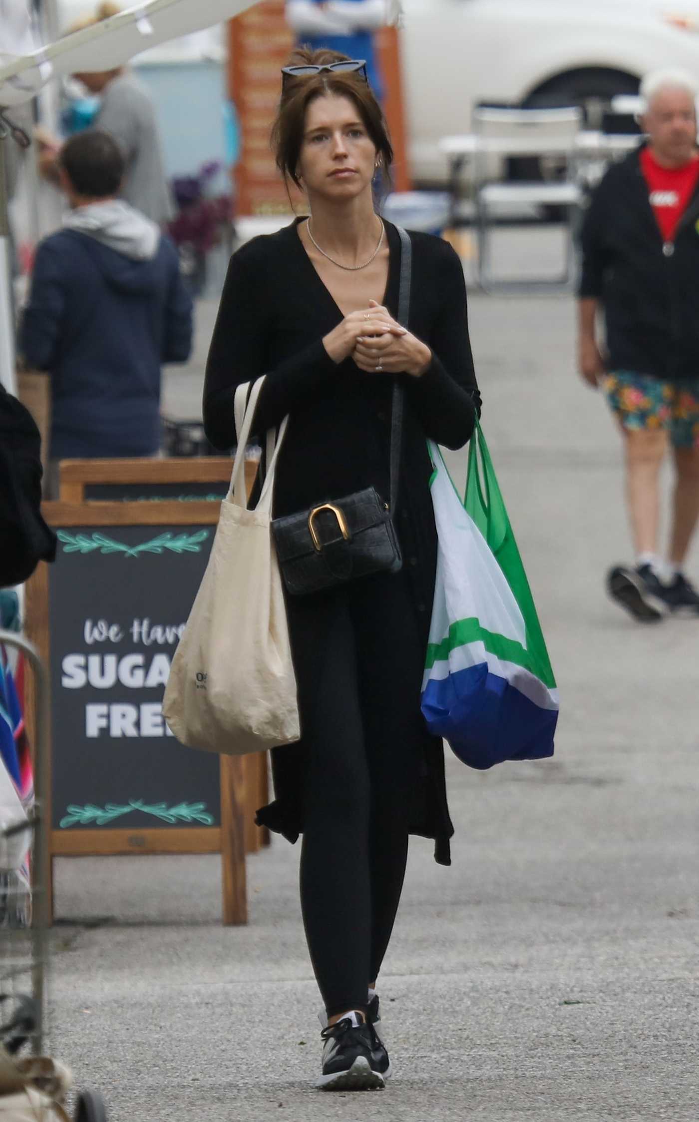 Katherine Schwarzenegger in a Black Cardigan Was Seen During Her Solo Trip to the Farmer's Market in Pacific Palisades 10/22/2023