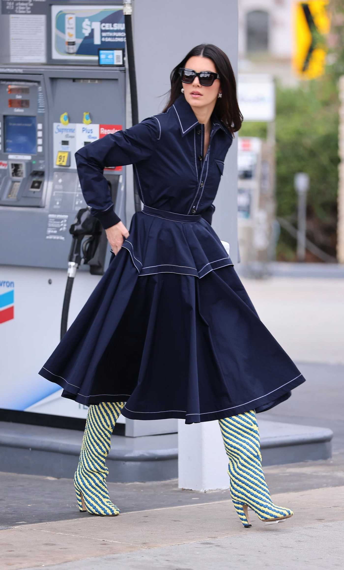 Kendall Jenner in a Blue Dress Making a Quick Pit Stop at a Gas Station in Calabasas 10/25/2023
