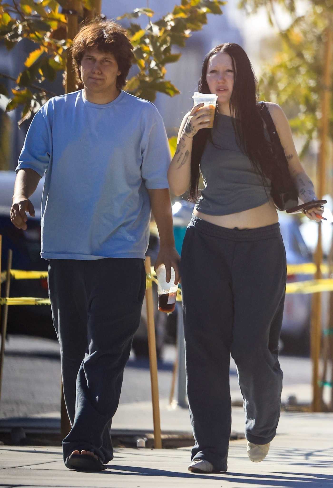 Noah Cyrus in a Grey Top Was Seen Out with Her Fiance Pinkus in West Hollywood 10/23/2023