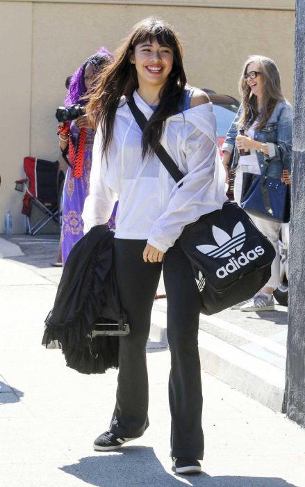 Xochitl Gomez in a Black Adidas Sneakers