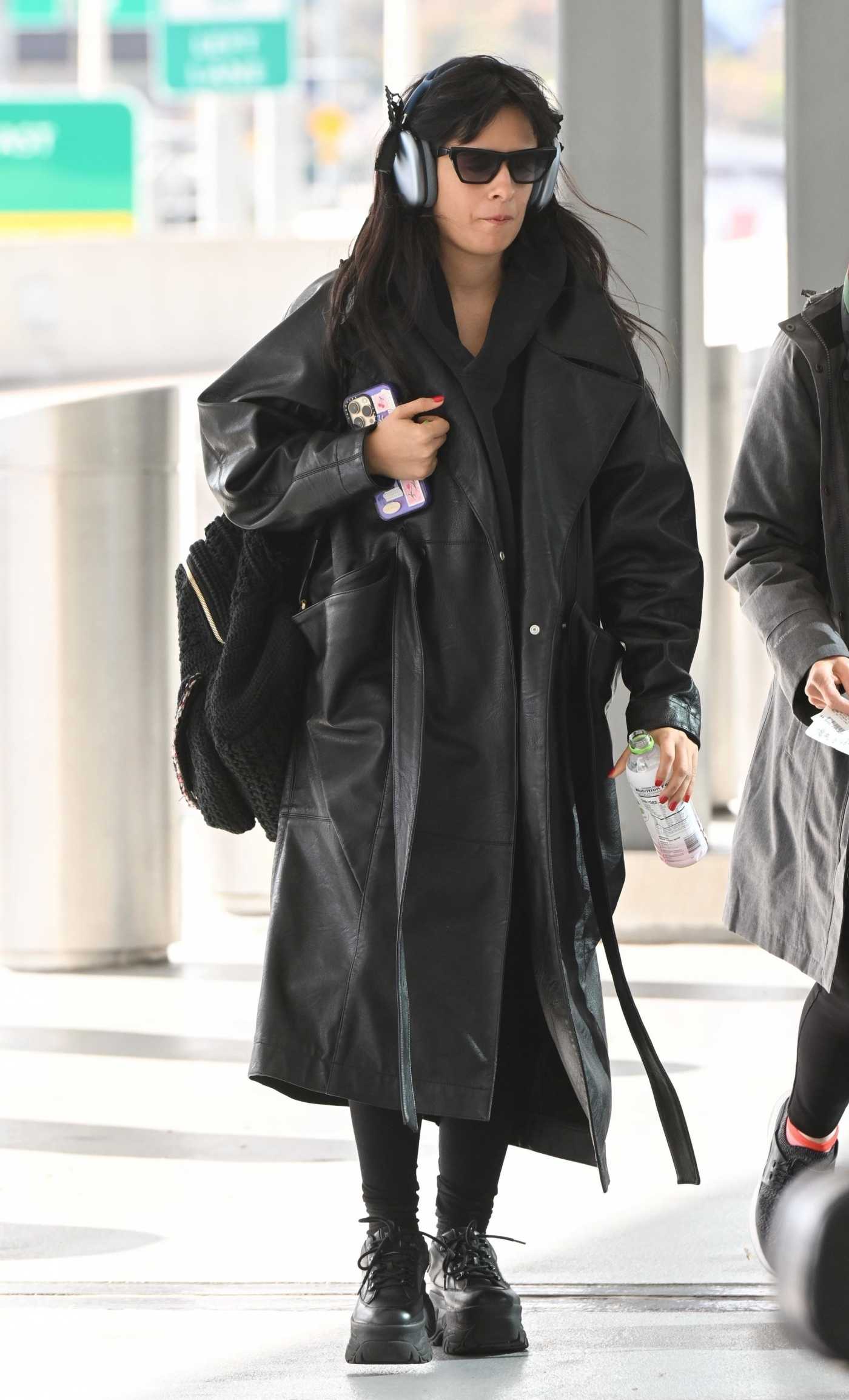 Camila Cabello in a Black Leather Coat Arrives at LaGuardia Airport in NYC 11/01/2023