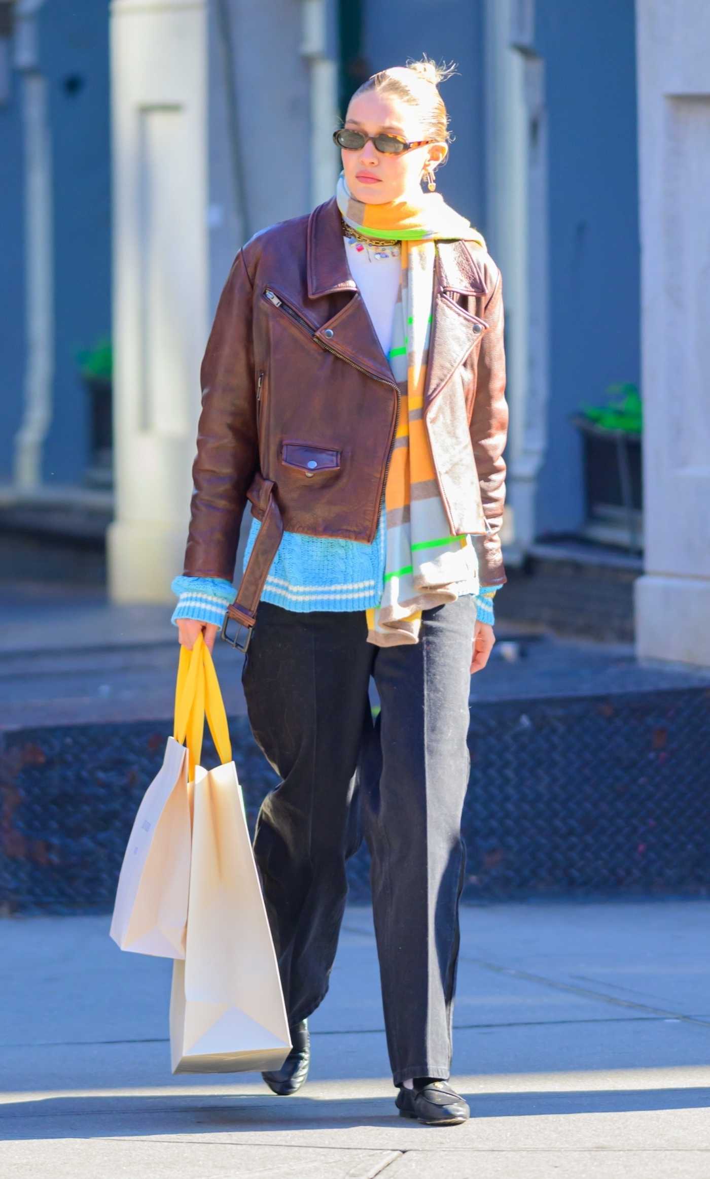 Gigi Hadid in a Brown Leather Jacket Leaves Her Store in New York City 11/02/2023
