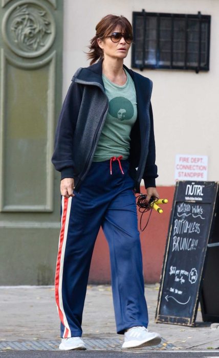 Helena Christensen in a Blue Track Pants