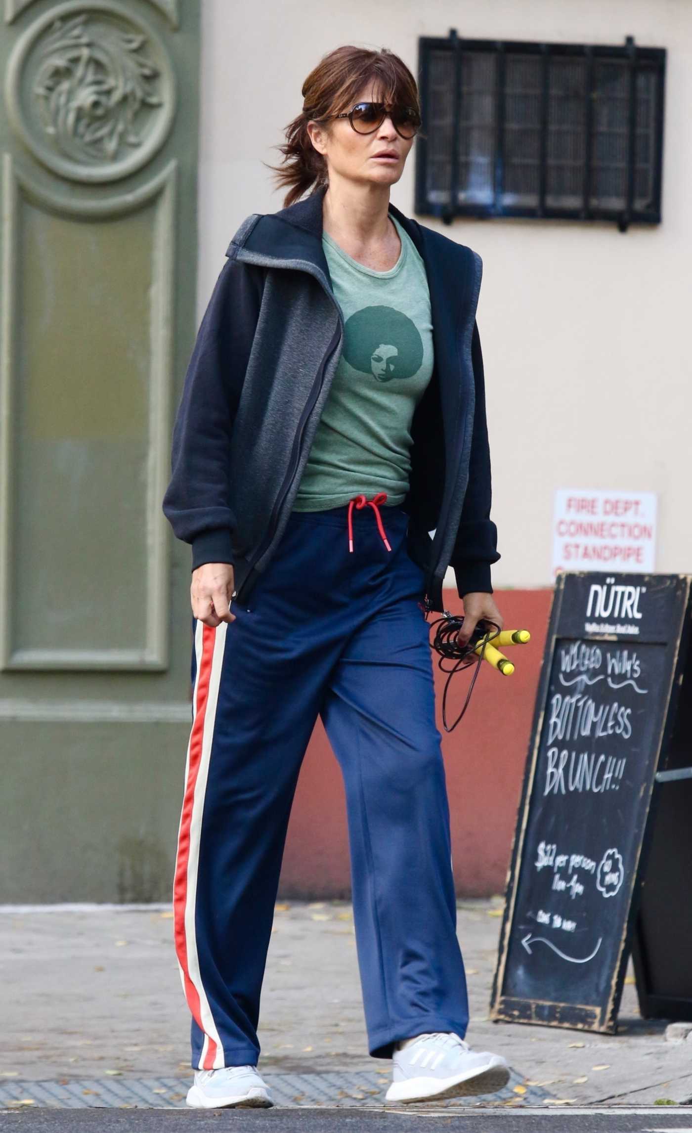 Helena Christensen in a Blue Track Pants Was Spotted Out in New York 11/22/2023