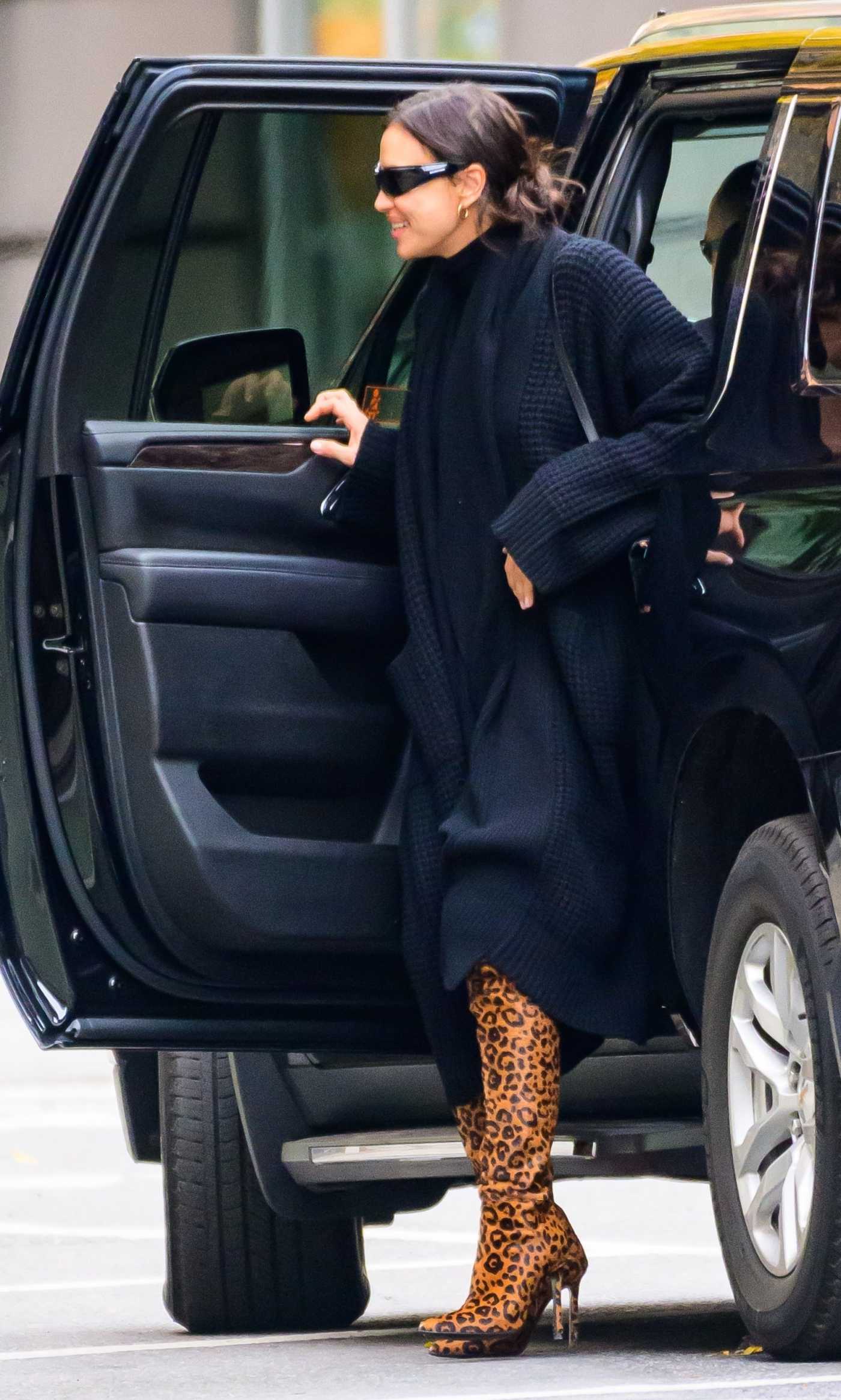 Irina Shayk in a Black Cardigan Was Spotted Entering Office Building in New York 11/21/2023