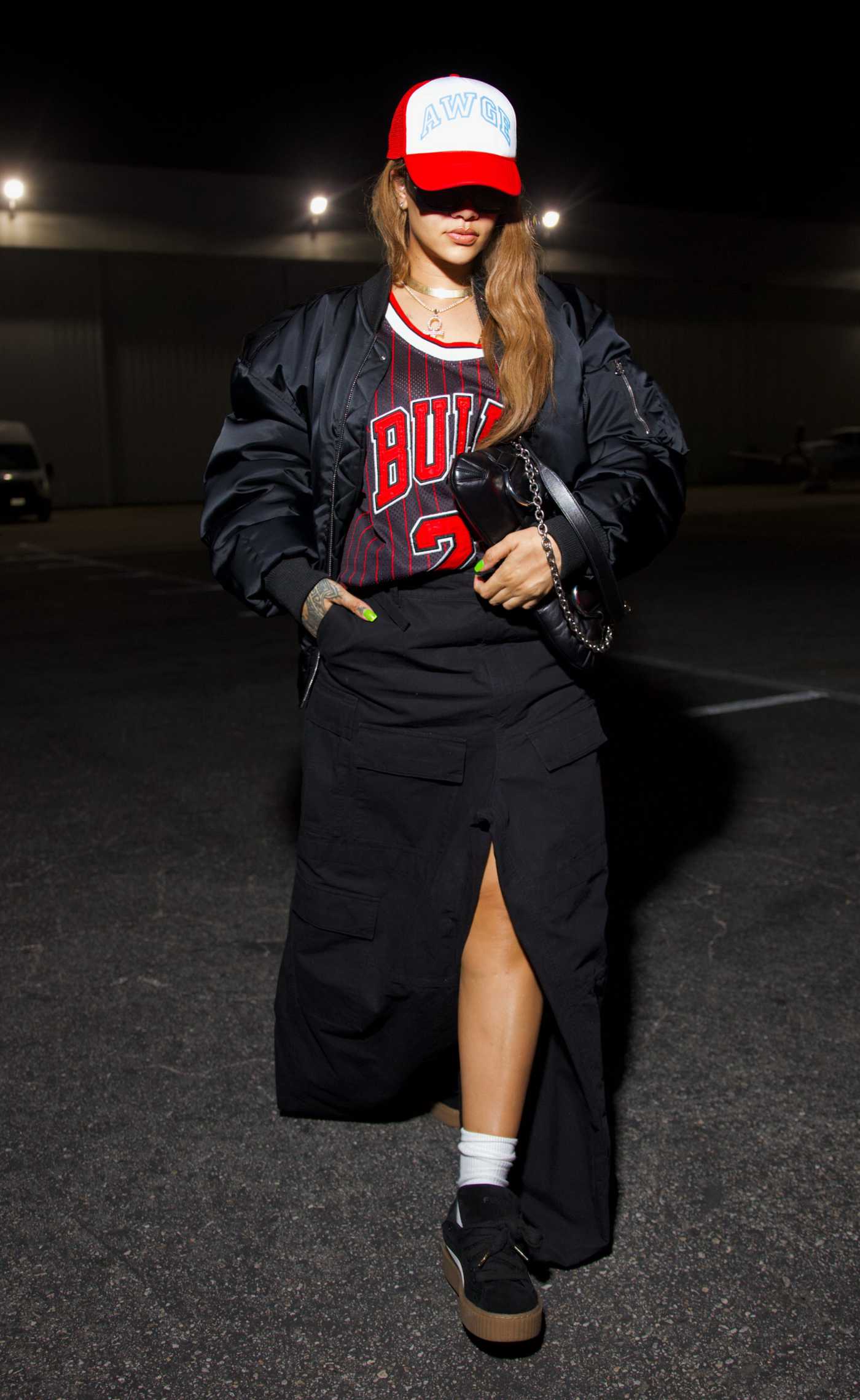 Rihanna in a Black Bomber Jacket Takes Flight for F1 Weekend in Las Vegas 11/16/2023