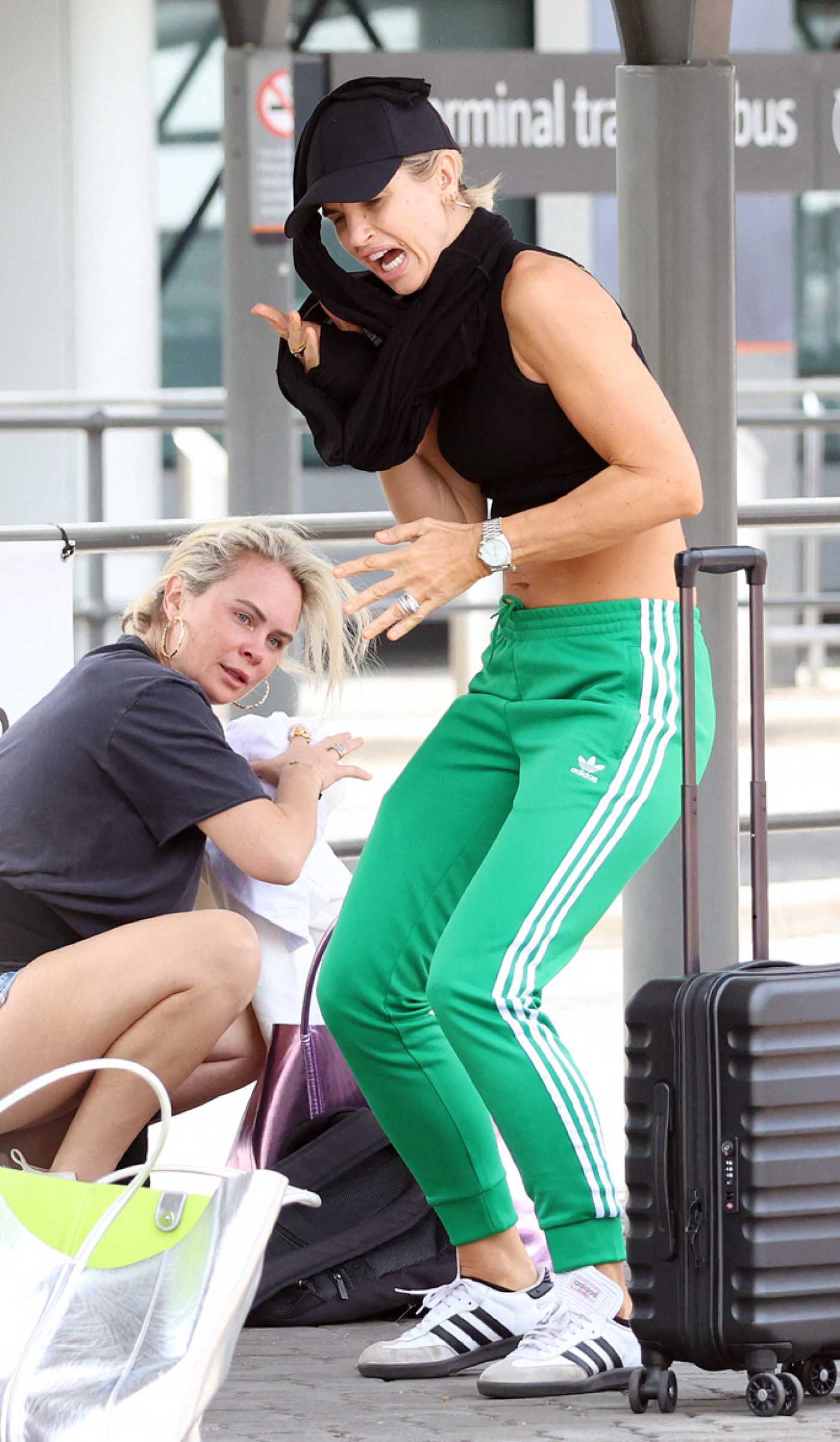 Vogue Williams in a Green Adidas Track Pants Departs Perth Airport in Perth 11/12/2023