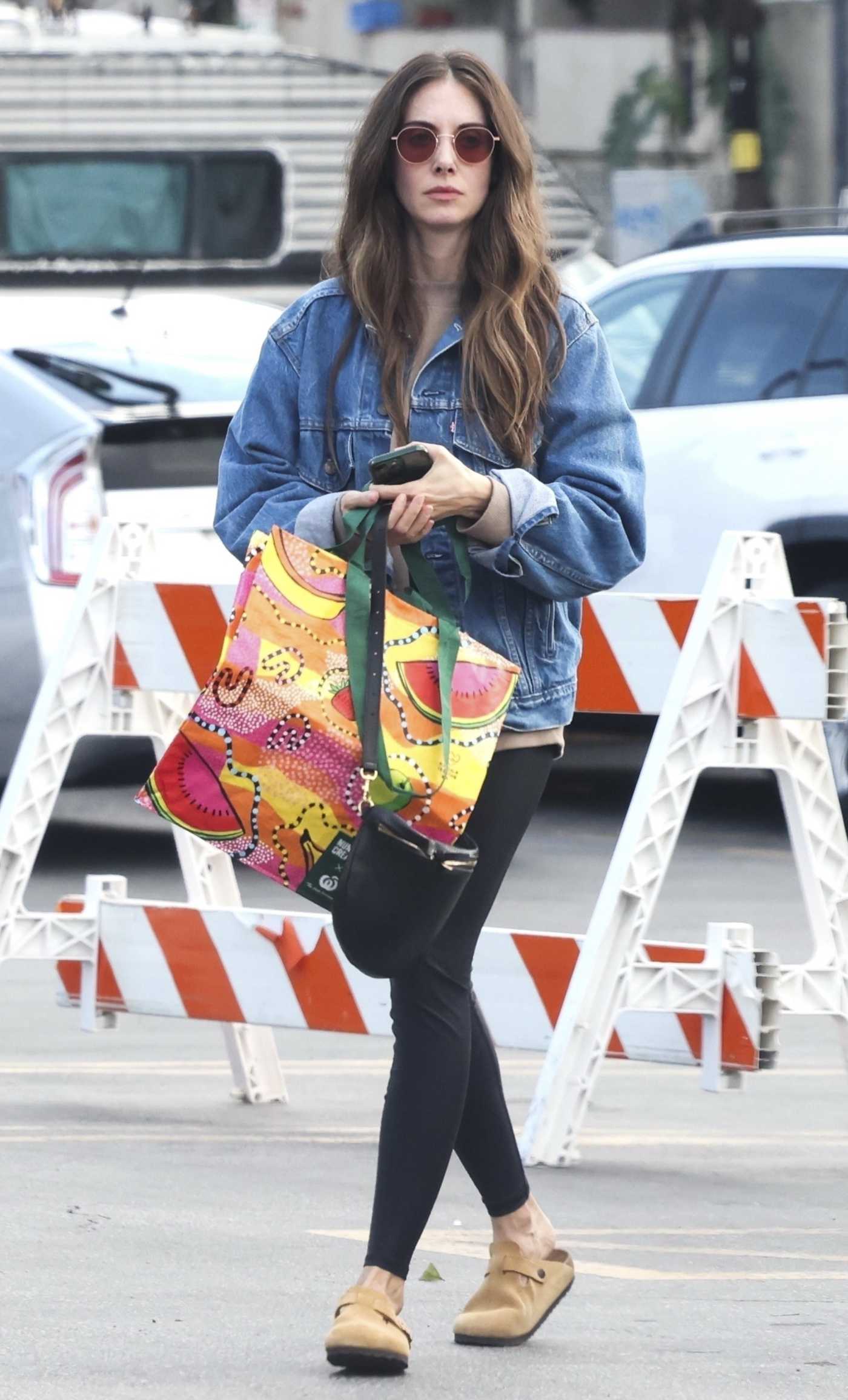 Alison Brie in a Blue Denim Jacket Leaves a Grocery Store in Los Feliz 12/23/2023