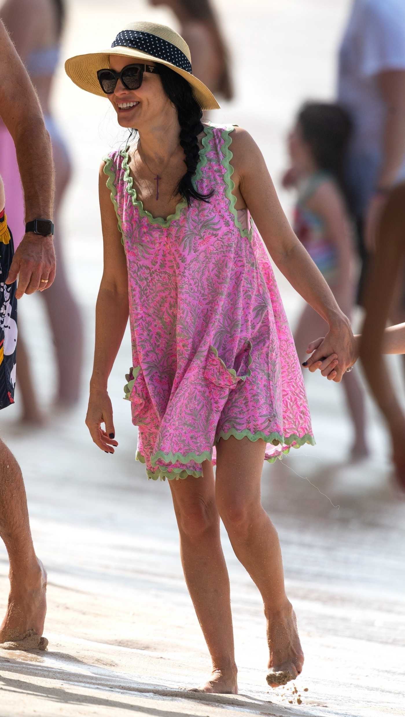 Andrea Corr in a Pink Mini Dress Was Spotted on Christmas Day on the Beach in Barbados 12/25/2023