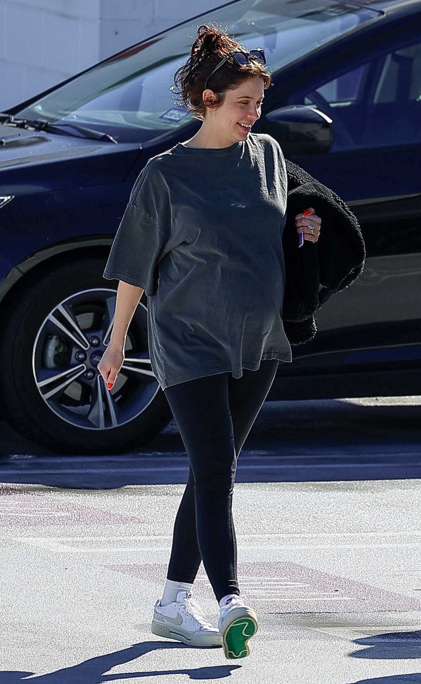 Ashley Benson in a Grey Tee Exits an Office in Los Angeles 01/23/2024
