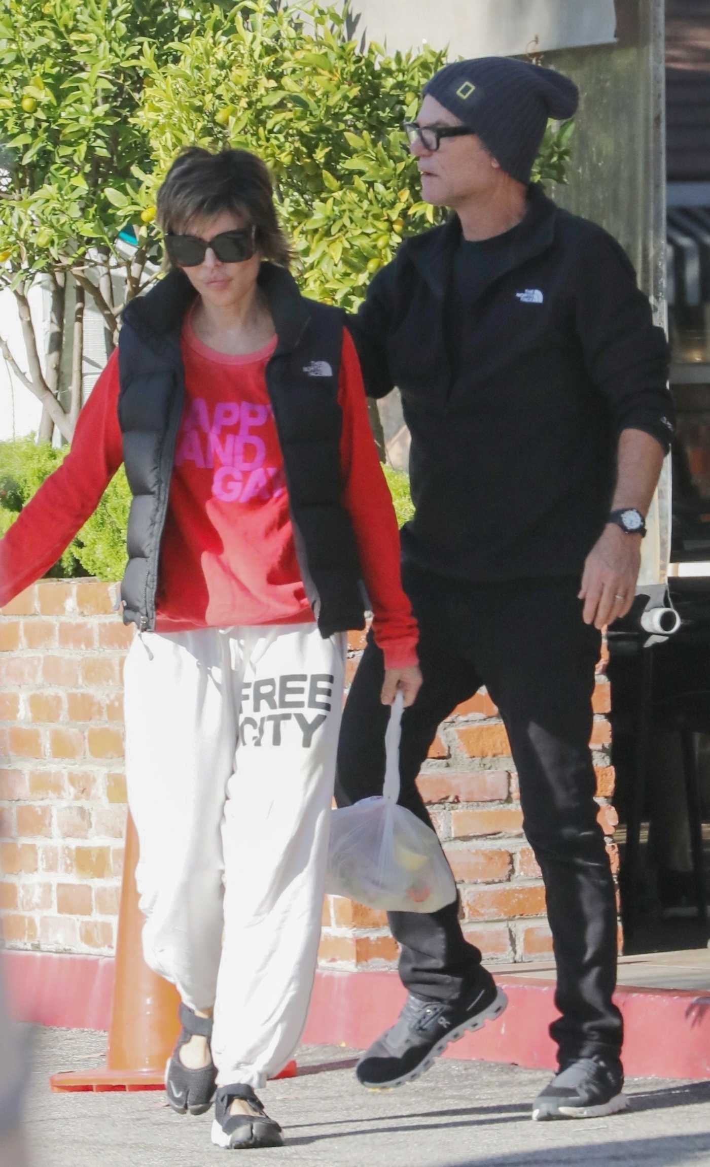 Lisa Rinna in a White Sweatpants Has a New Years Day Lunch Date with Harry Hamlin in Los Angeles 01/01/2024