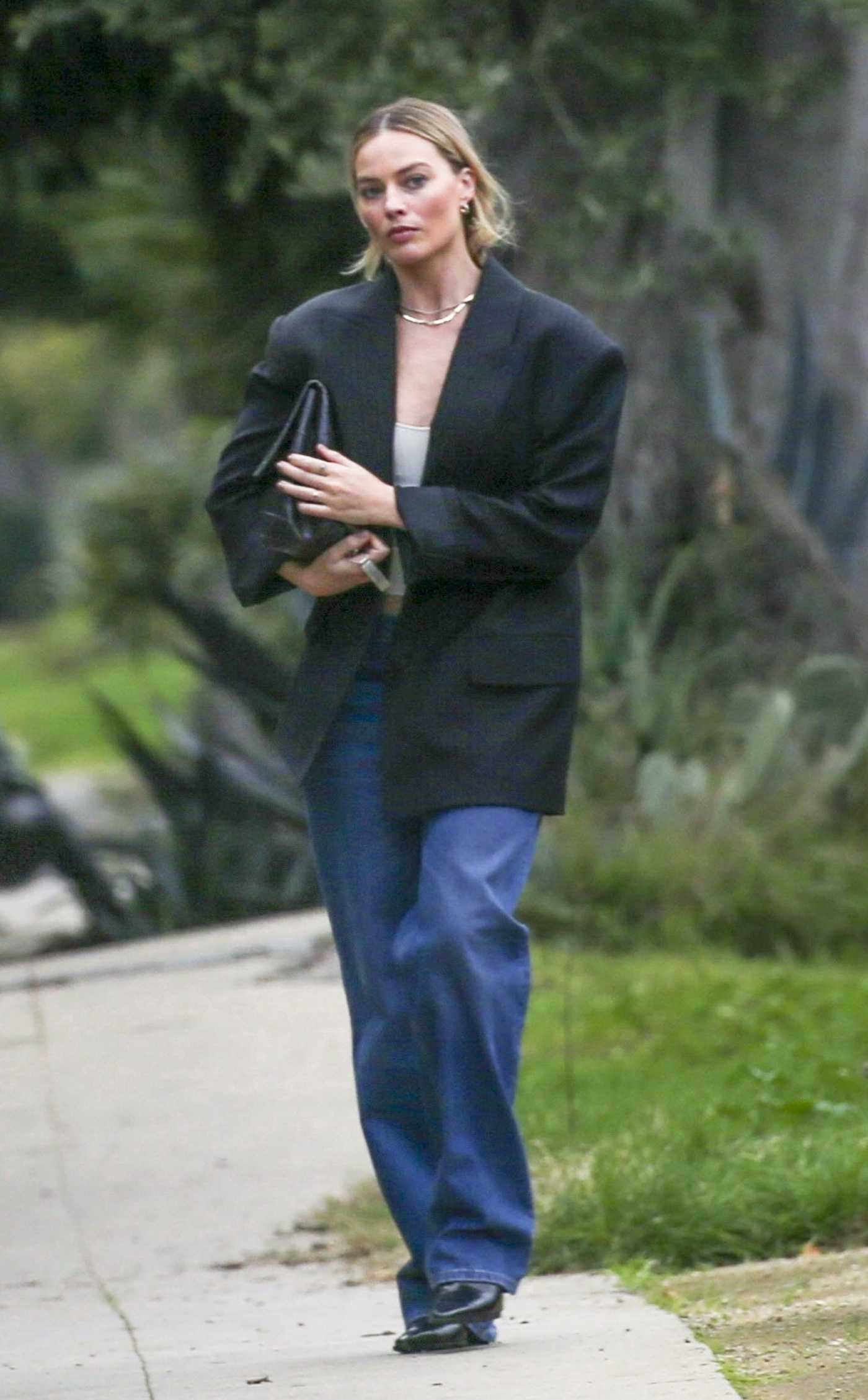 Margot Robbie in a Black Blazer Heads to a Friend's House in Santa Monica 01/17/2024