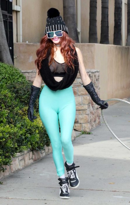 Phoebe Price in a Turquoise Leggings