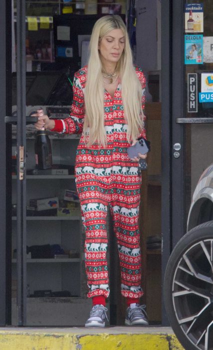 Tori Spelling in a Red Patterned Jumpsuit