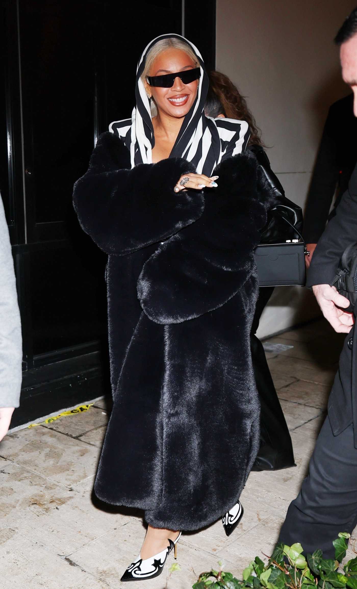 Beyonce in a Black Fur Coat Arrives at Paris Theater in New York 02/16/2024