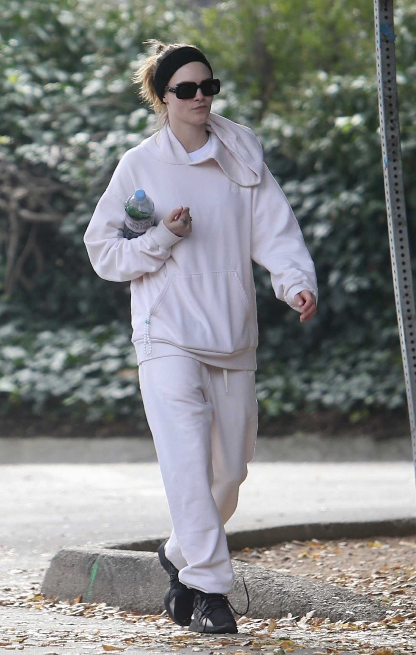 Cara Delevingne in a Black Sneakers Was Seen Out with Leah Mason in Hollywood Hills 01/31/2024