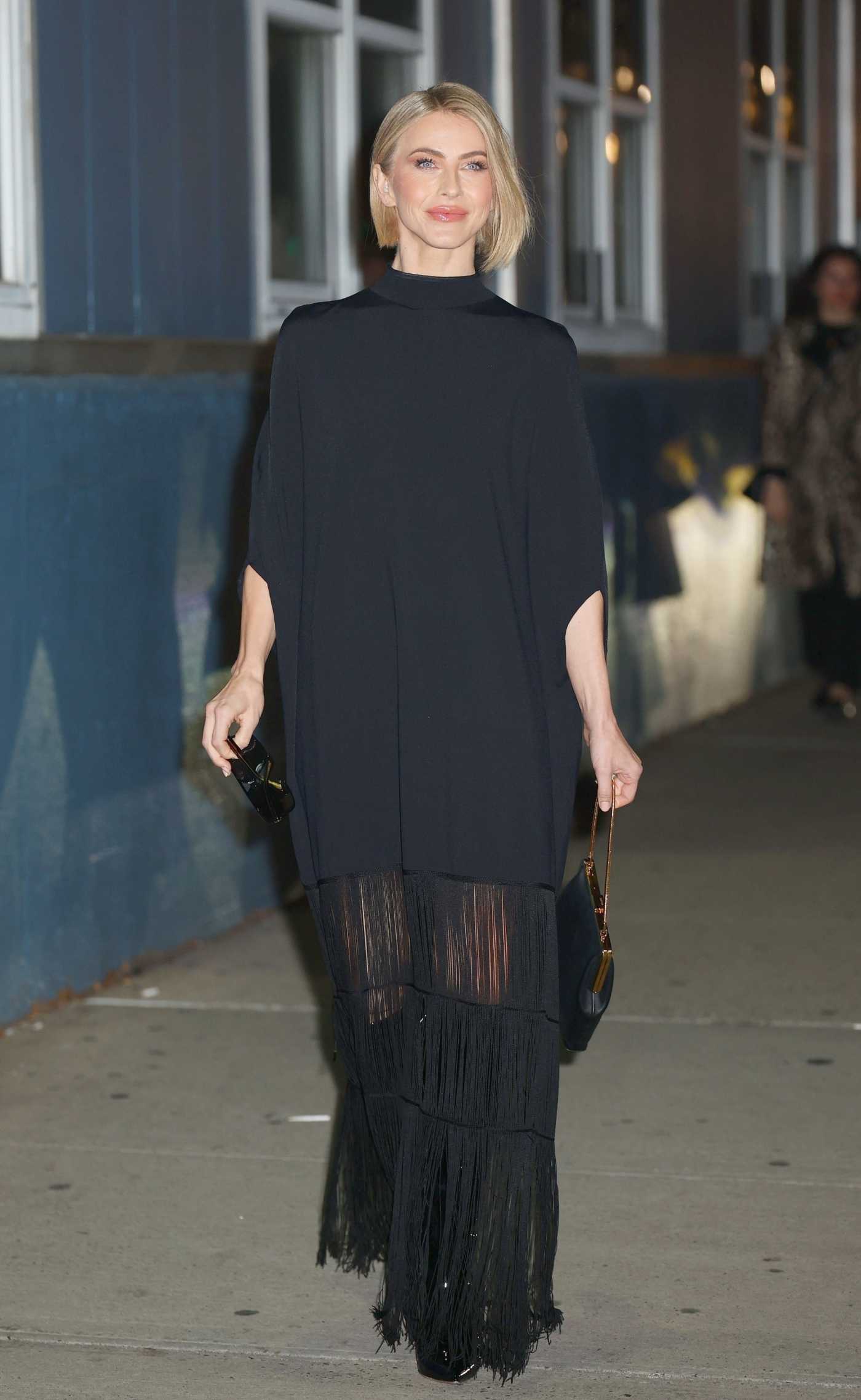 Julianne Hough in a Black Dress Arrives at the Khaite Fashion Show During 2024 NYFW in New York City 02/10/2024