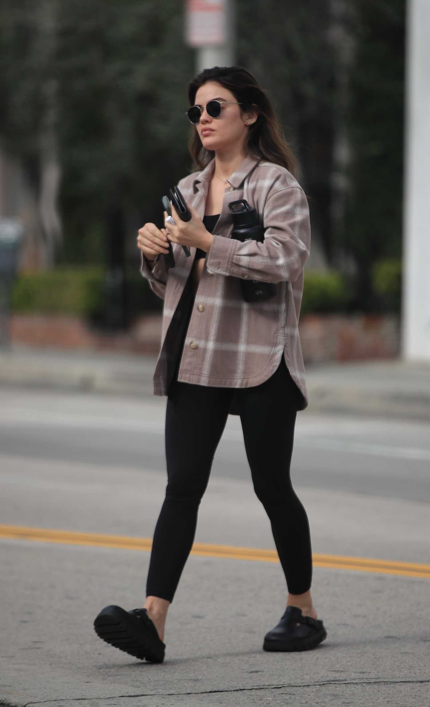 Lucy Hale in a Brown Plaid Shirt Heads to a Yoga Class in Los Angeles 02/10/2024