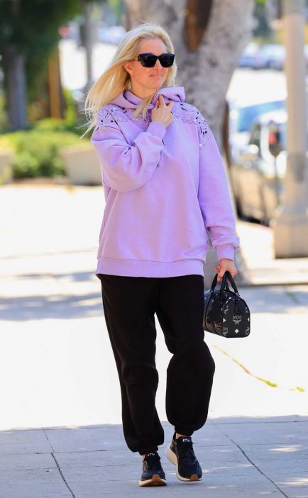 Erika Jayne in a Purple Hoodie