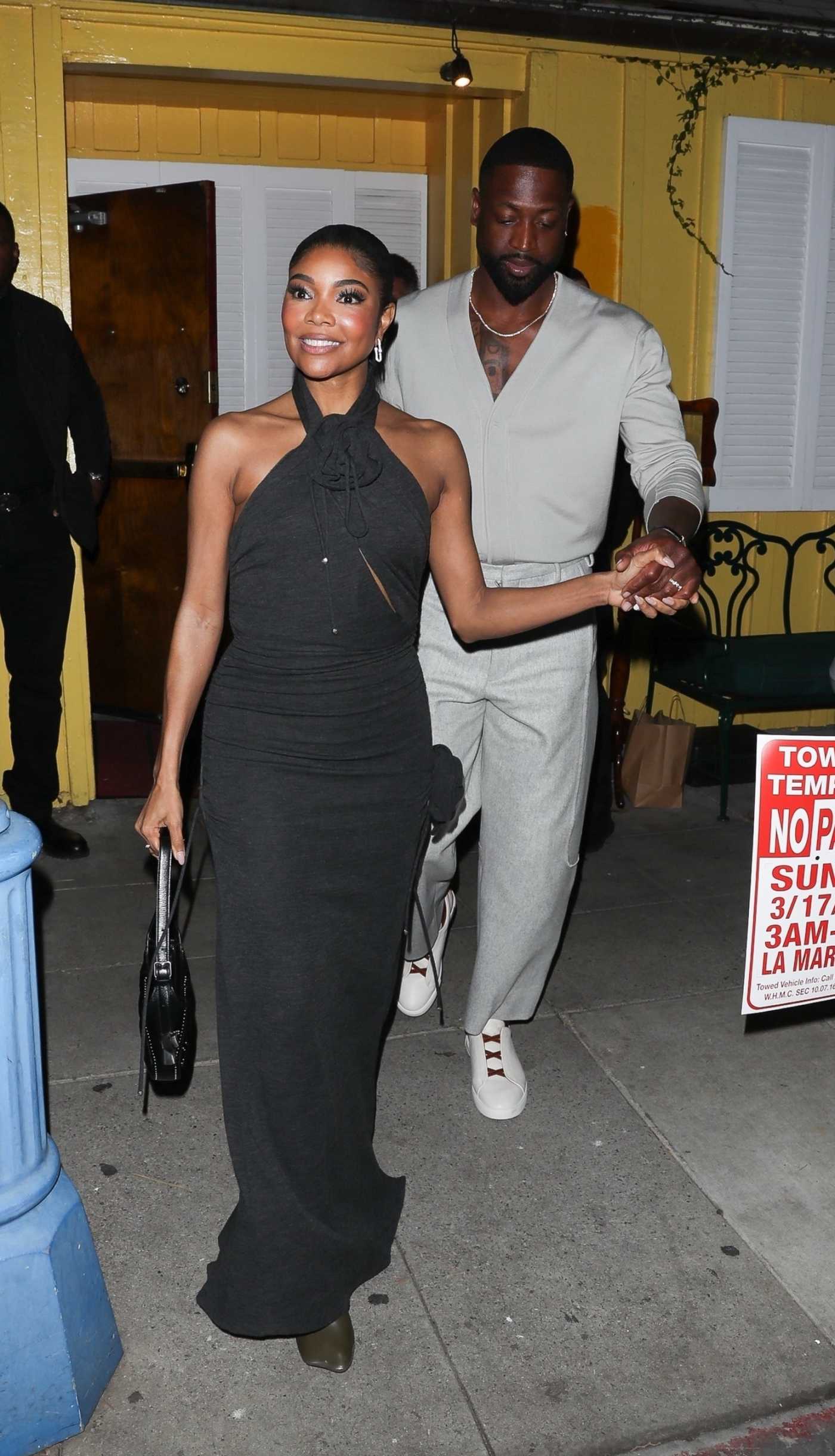 Gabrielle Union in a Black Dress Leave Dan Tana’s with Dwyane Wade in West Hollywood 03/15/2024
