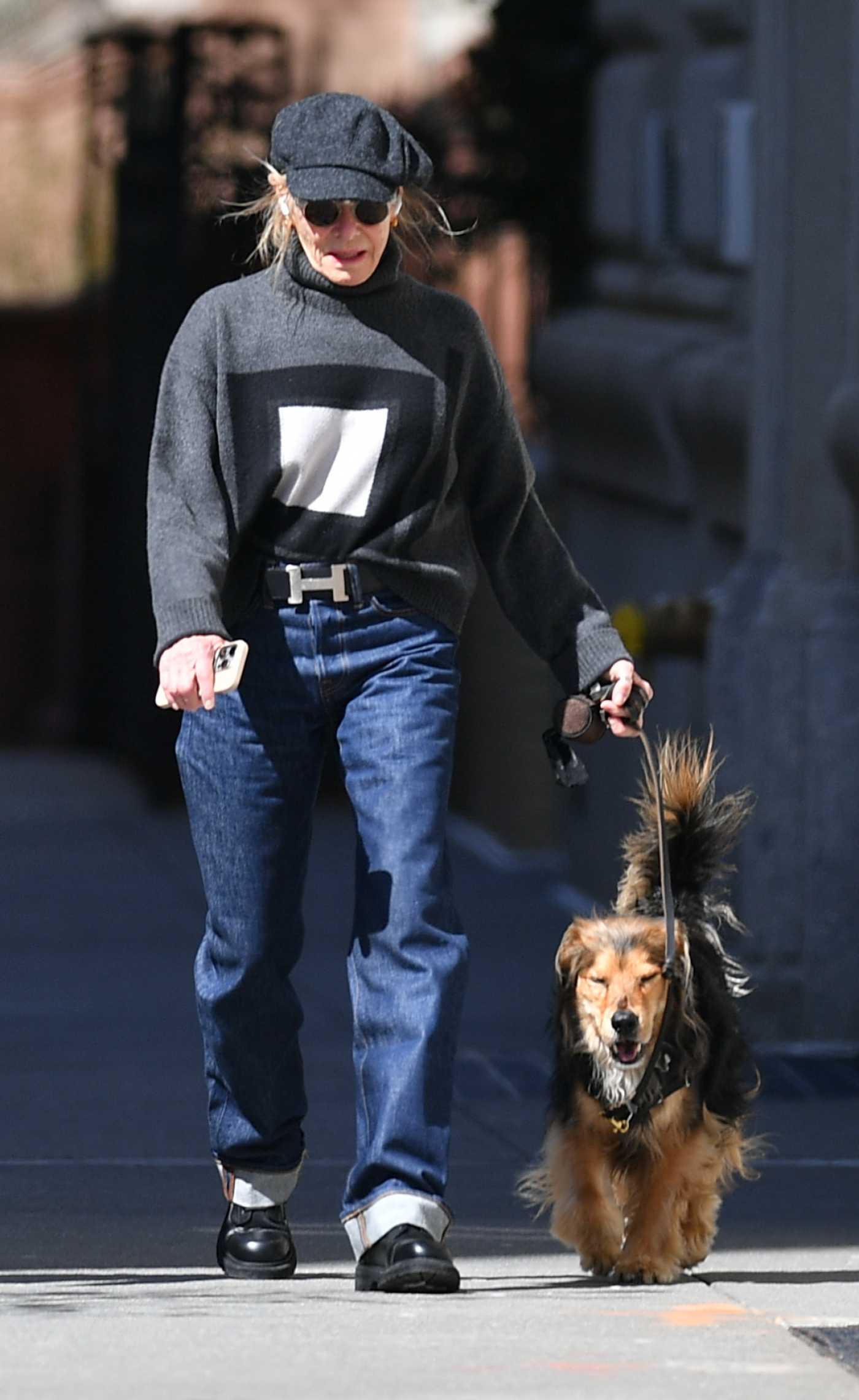 Kate Capshaw in a Black Cap Walks Her Dog in New York  03/17/2024