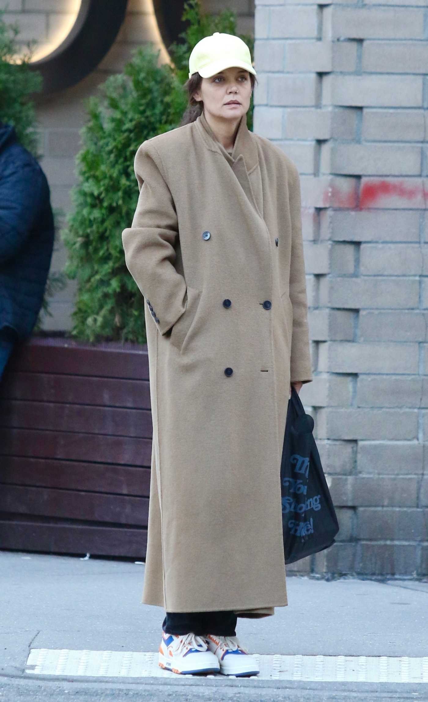 Katie Holmes in a Beige Coat Enjoying a Stroll through Soho in Manhattan in New York 03/16/2024